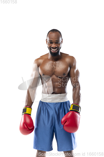 Image of Bright emotions of professional boxer isolated on white studio background, excitement in game