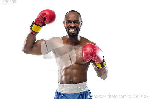 Image of Bright emotions of professional boxer isolated on white studio background, excitement in game