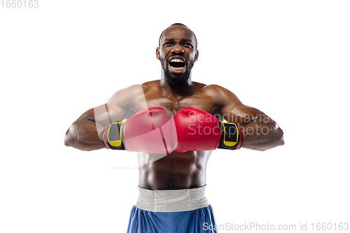 Image of Bright emotions of professional boxer isolated on white studio background, excitement in game