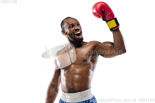 Image of Bright emotions of professional boxer isolated on white studio background, excitement in game