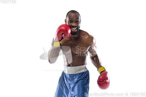 Image of Bright emotions of professional boxer isolated on white studio background, excitement in game