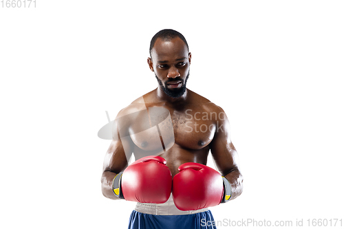 Image of Bright emotions of professional boxer isolated on white studio background, excitement in game