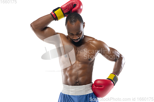 Image of Bright emotions of professional boxer isolated on white studio background, excitement in game