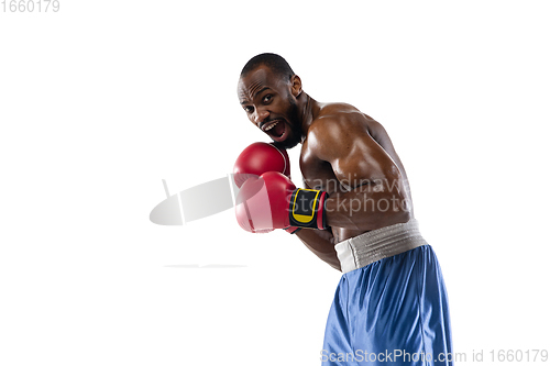 Image of Bright emotions of professional boxer isolated on white studio background, excitement in game