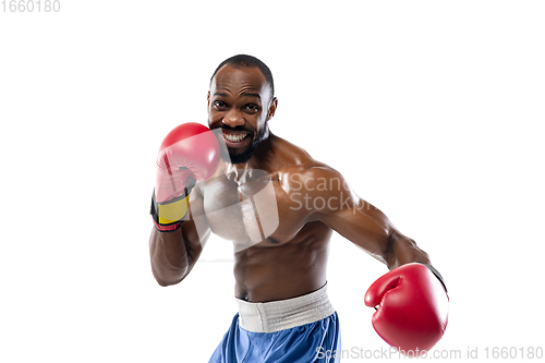 Image of Bright emotions of professional boxer isolated on white studio background, excitement in game