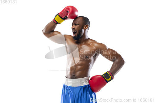 Image of Bright emotions of professional boxer isolated on white studio background, excitement in game