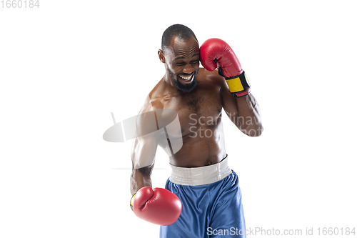 Image of Bright emotions of professional boxer isolated on white studio background, excitement in game