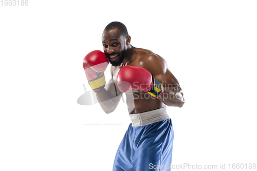 Image of Bright emotions of professional boxer isolated on white studio background, excitement in game