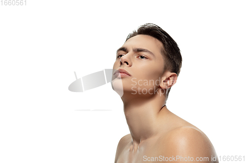 Image of Portrait of young man isolated on white studio background. Caucasian attractive male model. Concept of fashion and beauty, self-care, body and skin care.
