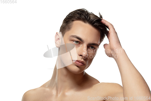 Image of Portrait of young man isolated on white studio background. Caucasian attractive male model. Concept of fashion and beauty, self-care, body and skin care.