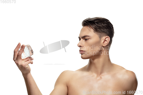 Image of Portrait of young man isolated on white studio background. Caucasian attractive male model. Concept of fashion and beauty, self-care, body and skin care.