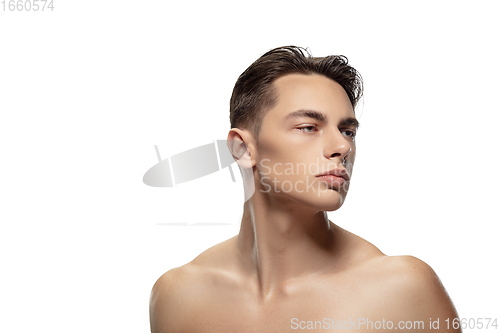 Image of Portrait of young man isolated on white studio background. Caucasian attractive male model. Concept of fashion and beauty, self-care, body and skin care.