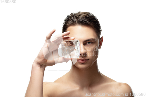 Image of Portrait of young man isolated on white studio background. Caucasian attractive male model. Concept of fashion and beauty, self-care, body and skin care.