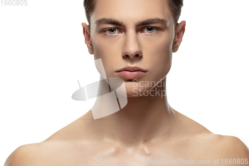 Image of Portrait of young man isolated on white studio background. Caucasian attractive male model. Concept of fashion and beauty, self-care, body and skin care.