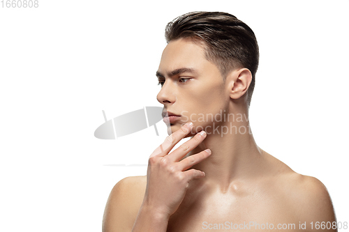 Image of Portrait of young man isolated on white studio background. Caucasian attractive male model. Concept of fashion and beauty, self-care, body and skin care.