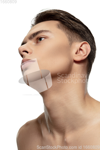 Image of Portrait of young man isolated on white studio background. Caucasian attractive male model. Concept of fashion and beauty, self-care, body and skin care.