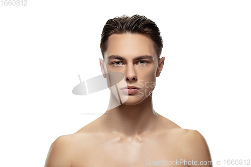 Image of Portrait of young man isolated on white studio background. Caucasian attractive male model. Concept of fashion and beauty, self-care, body and skin care.