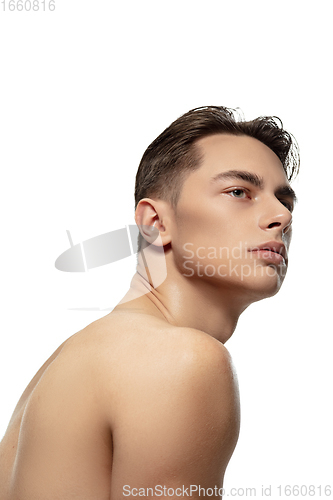 Image of Portrait of young man isolated on white studio background. Caucasian attractive male model. Concept of fashion and beauty, self-care, body and skin care.