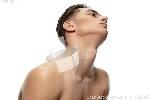 Image of Portrait of young man isolated on white studio background. Caucasian attractive male model. Concept of fashion and beauty, self-care, body and skin care.