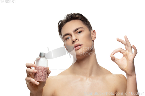 Image of Portrait of young man isolated on white studio background. Caucasian attractive male model. Concept of fashion and beauty, self-care, body and skin care.