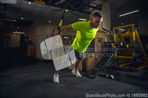 Image of Disabled man training in the gym of rehabilitation center