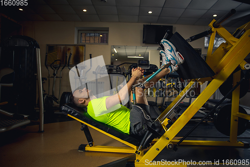 Image of Disabled man training in the gym of rehabilitation center