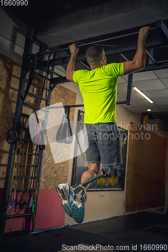 Image of Disabled man training in the gym of rehabilitation center