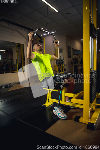 Image of Disabled man training in the gym of rehabilitation center