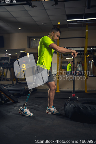 Image of Disabled man training in the gym of rehabilitation center