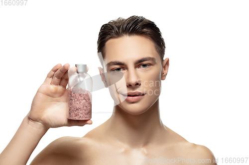 Image of Portrait of young man isolated on white studio background. Caucasian attractive male model. Concept of fashion and beauty, self-care, body and skin care.