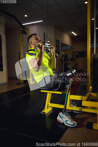 Image of Disabled man training in the gym of rehabilitation center