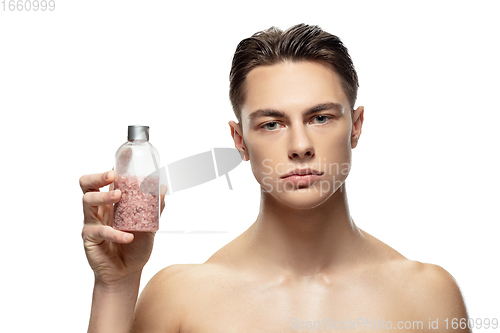 Image of Portrait of young man isolated on white studio background. Caucasian attractive male model. Concept of fashion and beauty, self-care, body and skin care.