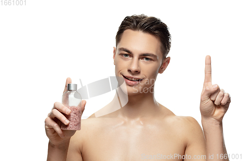 Image of Portrait of young man isolated on white studio background. Caucasian attractive male model. Concept of fashion and beauty, self-care, body and skin care.