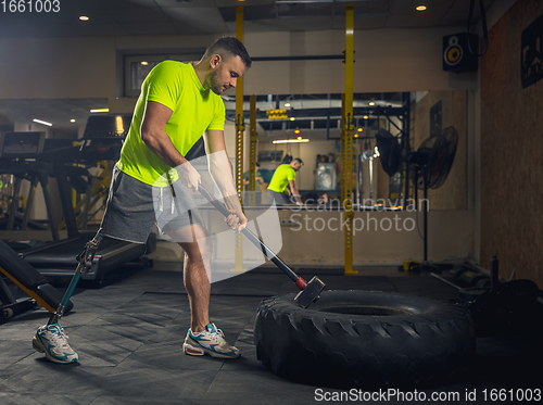 Image of Disabled man training in the gym of rehabilitation center