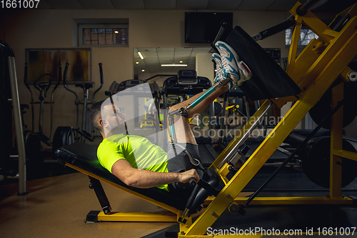 Image of Disabled man training in the gym of rehabilitation center