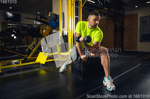 Image of Disabled man training in the gym of rehabilitation center