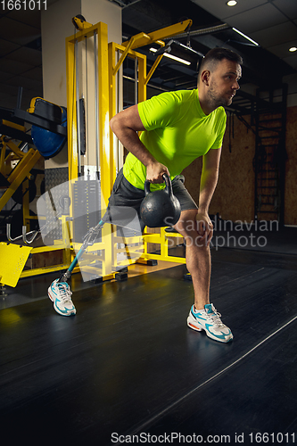 Image of Disabled man training in the gym of rehabilitation center