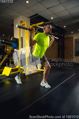 Image of Disabled man training in the gym of rehabilitation center