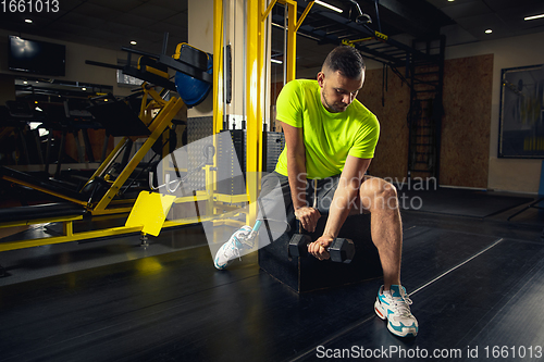 Image of Disabled man training in the gym of rehabilitation center