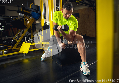 Image of Disabled man training in the gym of rehabilitation center