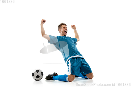 Image of Funny emotions of professional soccer player isolated on white studio background, excitement in game