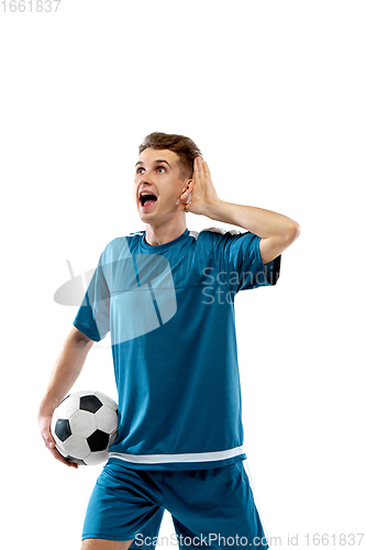 Image of Funny emotions of professional soccer player isolated on white studio background, excitement in game