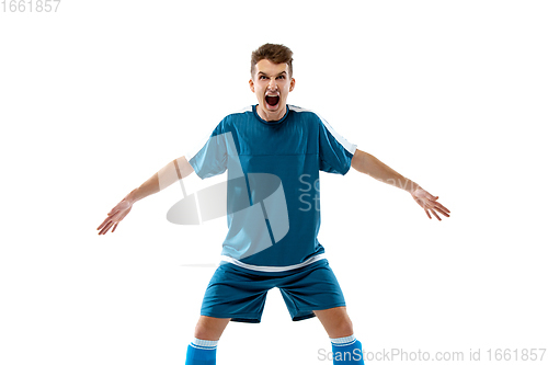 Image of Funny emotions of professional soccer player isolated on white studio background, excitement in game