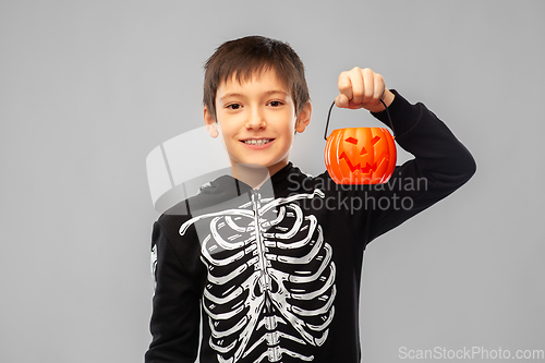 Image of boy in halloween costume with jack-o-lantern