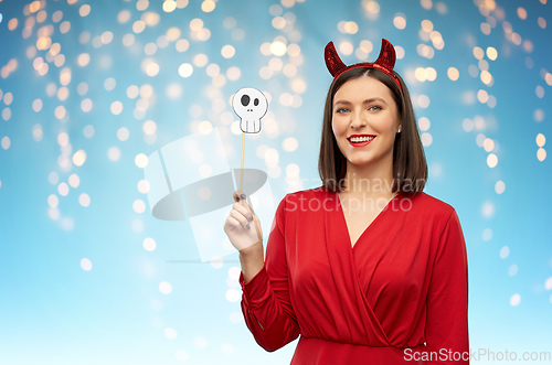 Image of happy woman in red halloween costume of devil