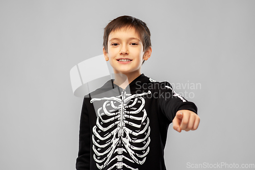 Image of boy in halloween costume of skeleton