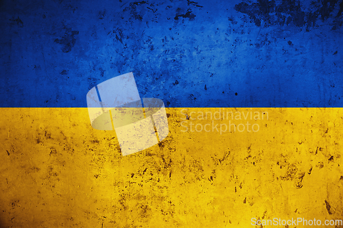 Image of Grungy and damaged wall painted with blue and yellow paint like