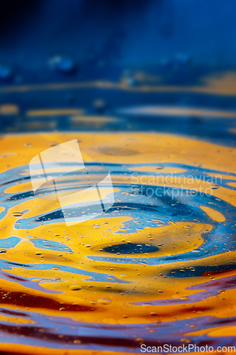 Image of Close-up view on blue and yellow aquarelle paint like Ukrainian