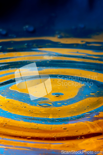 Image of Close-up view on blue and yellow aquarelle paint like Ukrainian