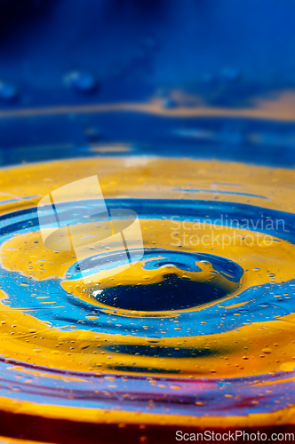 Image of Close-up view on blue and yellow aquarelle paint like Ukrainian